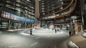 True North Square at Night. There is a light dusting of snow on the ground which is reflecting some of the plaza's lights.