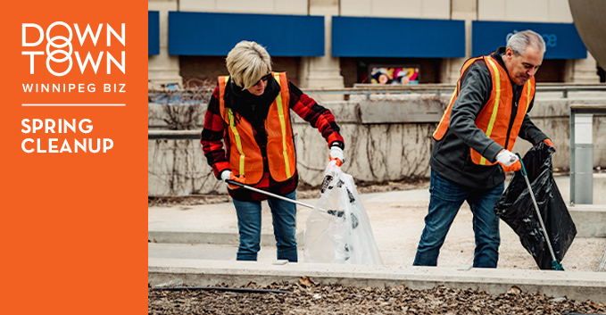two people cleaning up litter at the millennium library in downtown Winnipeg